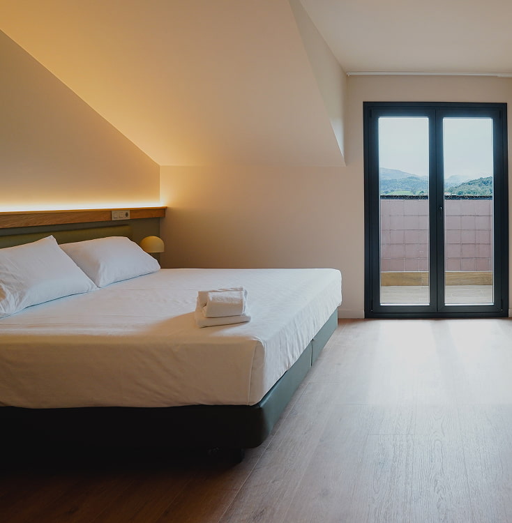 Superior triple room Los Pasiegos Superior triple room with King size bed and balcony with mountain views