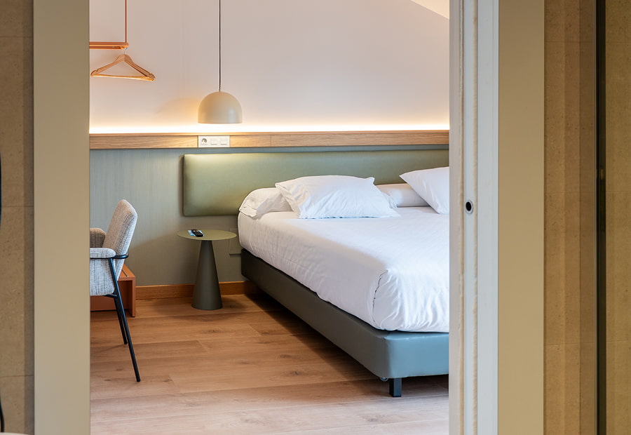 Superior double room Superior double room with king size bed, view from bathroom door