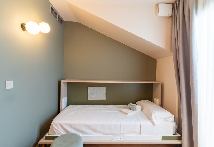 Superior triple room with extra bed Superior triple room with pull-out extra bed