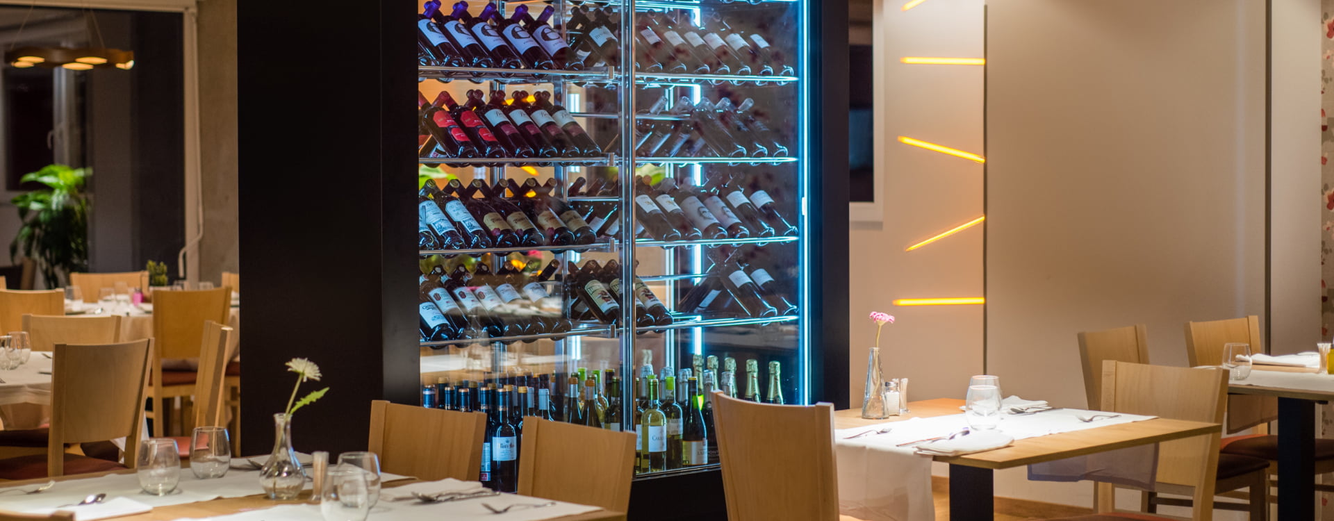 los pasiegos menu Fridge with wine bottles