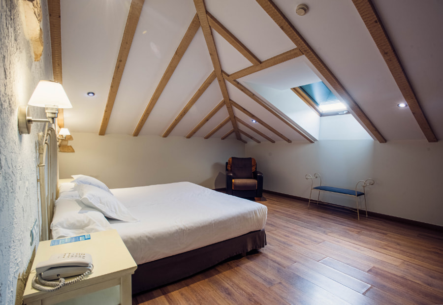 Deluxe Room 2 Room with double bed and armchair