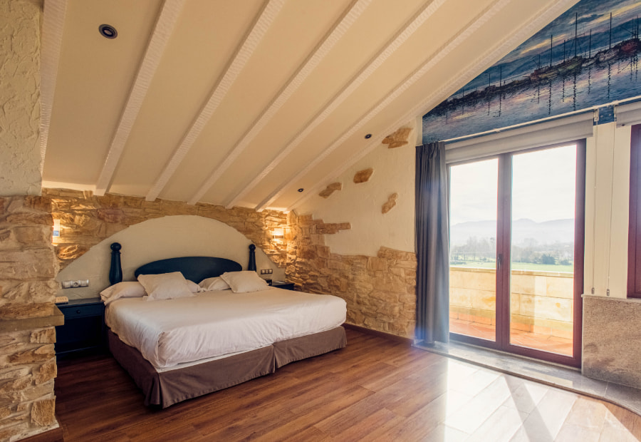 Suite Superior 2 Bedroom with double bed and exit to the terrace